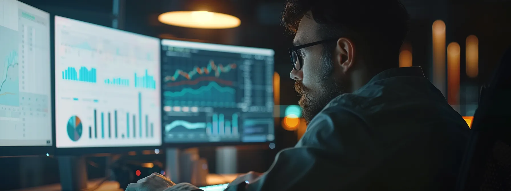 a person analyzing charts and graphs on a computer screen to assess and adjust their seo plan.