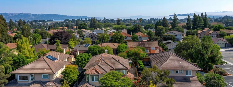 a stunning aerial view of a real estate neighborhood with vibrant local seo signs popping out of each house's garden.