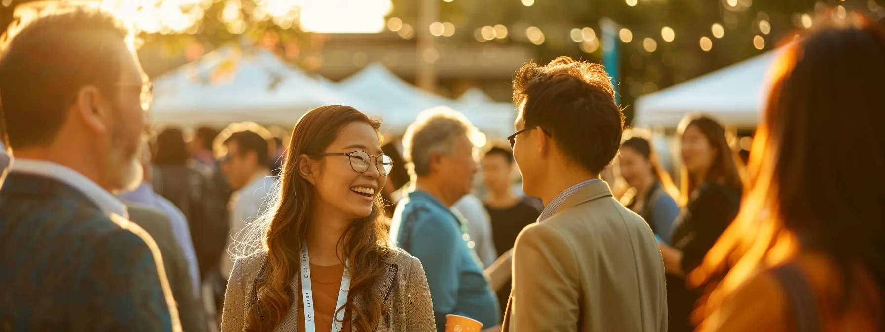 a professional real estate agent engaging with local community members at a neighborhood event, showcasing expertise and involvement in regional matters.