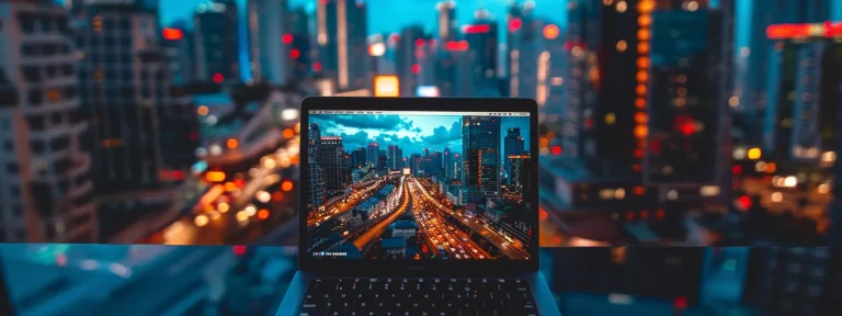 a laptop displaying a stunning aerial view of a bustling cityscape with skyscrapers and traffic, representing successful guest blogging as a key element in an effective rei seo strategy.