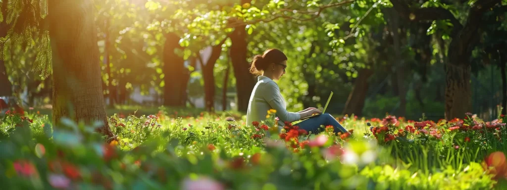 a person working on a laptop in a sunny park, surrounded by green trees and brightly colored flowers, optimizing their real estate investing website for mobile seo.