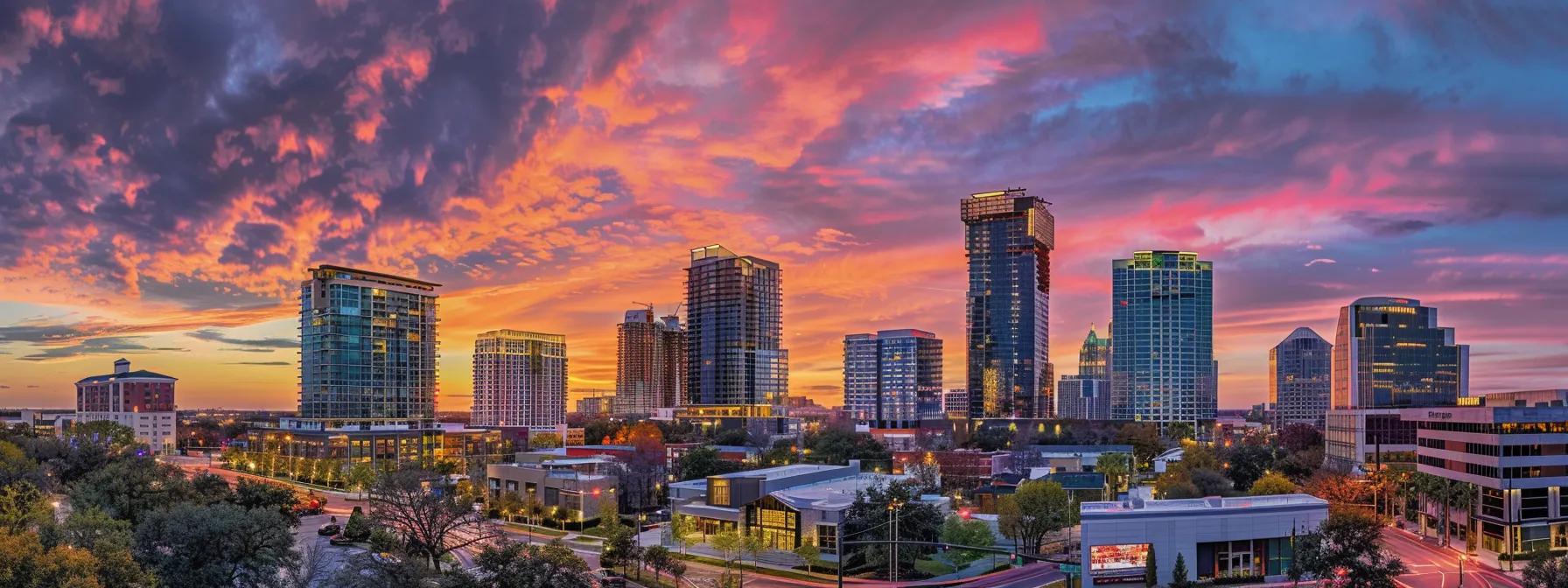 a vibrant city skyline at sunset, featuring distinct residential and commercial buildings under a colorful sky, symbolizing the diversity of real estate opportunities.