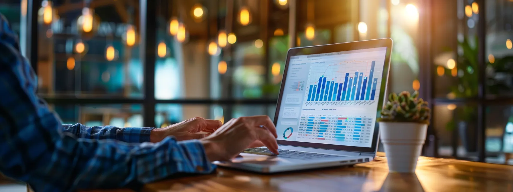a focused real estate professional reviews a high-resolution laptop screen displaying vibrant charts and metrics related to facebook pixel events, set in a sleek, modern office brimming with digital marketing materials.