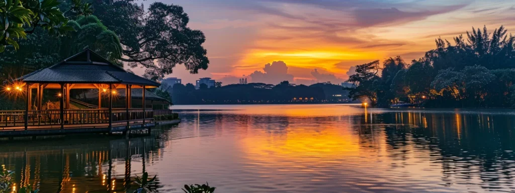 a vibrant sunset casts a warm glow over a tranquil lake, reflecting the fiery colors in the still water surrounded by silhouettes of lush trees.